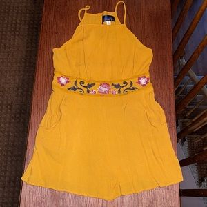 yellow romper with printed middle